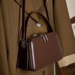 Spring/Summer 25 new niche design ear-hook series Handbag, eaves bag, genuine leather women's commuter crossbody bag