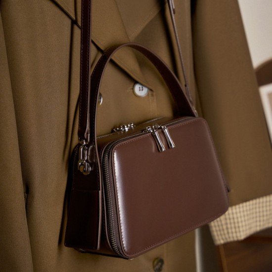 Spring/Summer 25 new niche design ear-hook series Handbag, eaves bag, genuine leather women's commuter crossbody bag Spring/Summer 25 new niche design ear-hook series Handbag, eaves bag, genuine leather women's commuter crossbody bag