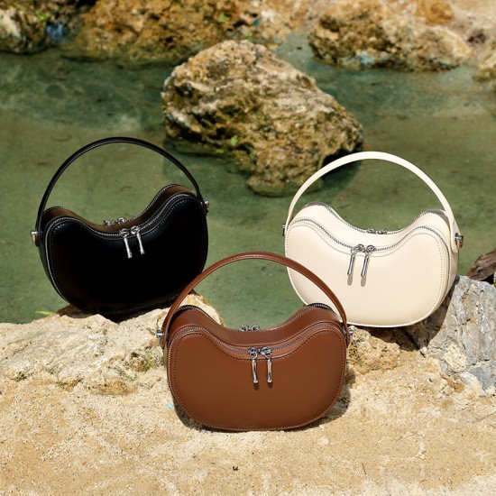 New niche design genuine leather Apple Yuanbao Super hot summer bags, exquisite, high-end handbags, shoulder bags, and crossbody bags for women. New niche design genuine leather Apple Yuanbao Super hot summer bags, exquisite, high-end handbags, shoulder bags, and crossbody bags for women.