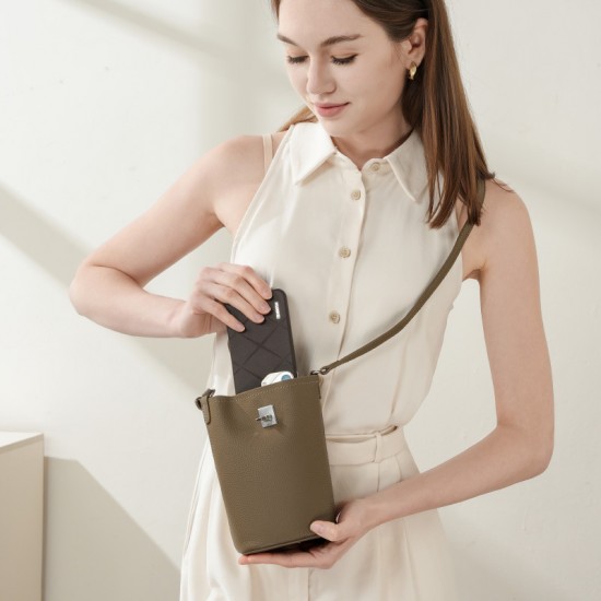 First-grain cowhide shoulder and crossbody small phone bag, versatile women's 2025 new genuine leather vertical casual small bucket bag. First-grain cowhide shoulder and crossbody small phone bag, versatile women's 2025 new genuine leather vertical casual small bucket bag.