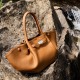 Stylish and simple large-capacity genuine leather tote bags, niche European and American solid-color wing bags, versatile commuter bags Stylish and simple large-capacity genuine leather tote bags, niche European and American solid-color wing bags, versatile commuter bags