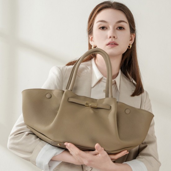 Stylish and simple large-capacity genuine leather tote bags, niche European and American solid-color wing bags, versatile commuter bags Stylish and simple large-capacity genuine leather tote bags, niche European and American solid-color wing bags, versatile commuter bags