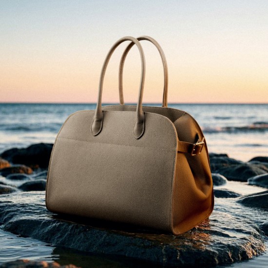 2025 Spring/Summer new TOGO top-grain leather tote bag, large-capacity niche travel handbag, genuine leather women's bag