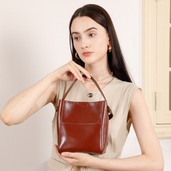 2025 new retro vegetable-tanned cowhide small bucket bag, niche genuine leather single-shoulder crossbody handbags