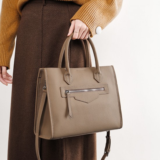 Large Large-capacity women's genuine leather tote, niche design, high-end commuter laptop briefcase.