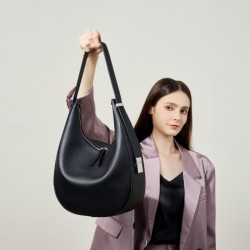 2025 spring and summer new niche design cowhide underarm bag, shoulder and handbag, genuine leather crescent bucket bag for women