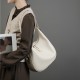 2025 spring and summer new niche design cowhide underarm bag, shoulder and handbag, genuine leather crescent bucket bag for women