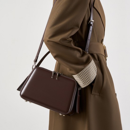 Spring/Summer 25 new niche design ear-hook series Handbag, eaves bag, genuine leather women's commuter crossbody bag Spring/Summer 25 new niche design ear-hook series Handbag, eaves bag, genuine leather women's commuter crossbody bag