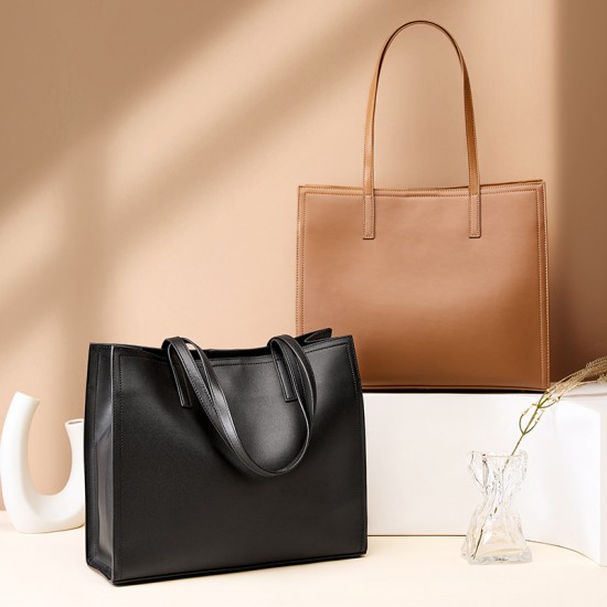 New niche women's genuine leather large-capacity briefcase, laptop bag, black cowhide commuter bag. New niche women's genuine leather large-capacity briefcase, laptop bag, black cowhide commuter bag.